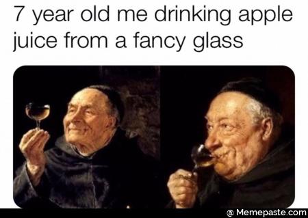 Seven year old me drinking apple juice from a fancy glass